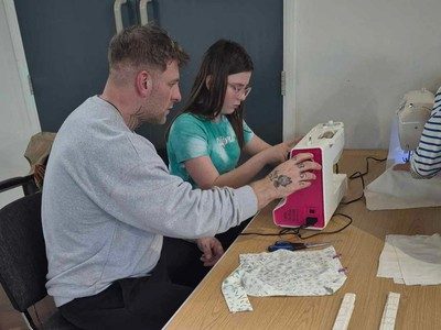 Dad and Daughter Sewing