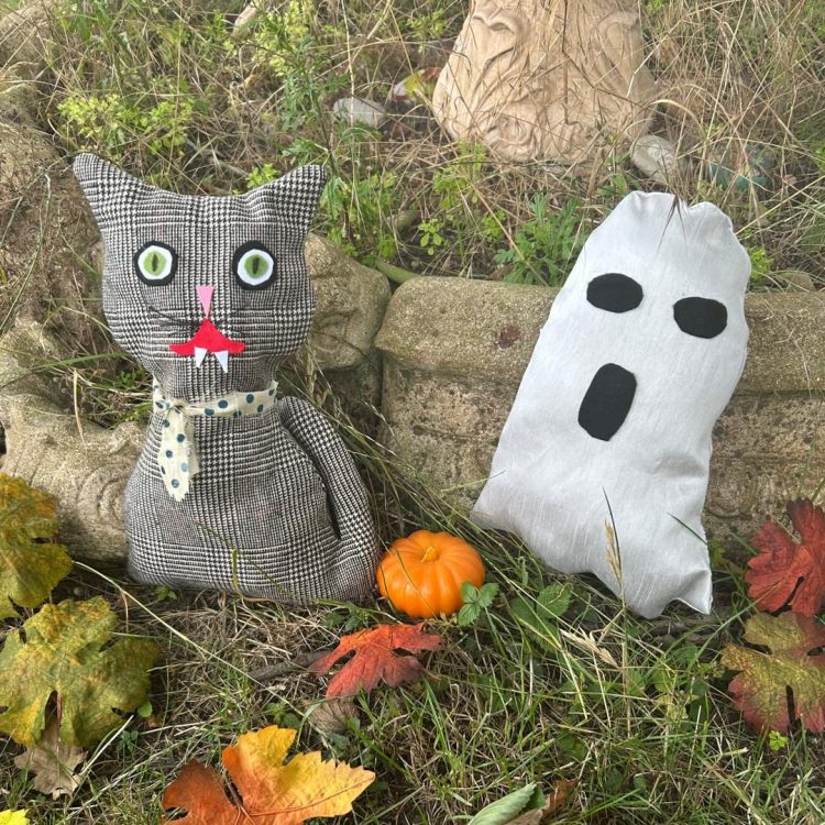 Spooky cat and ghost decorations made by Family Fabric Creators staff and volunteers