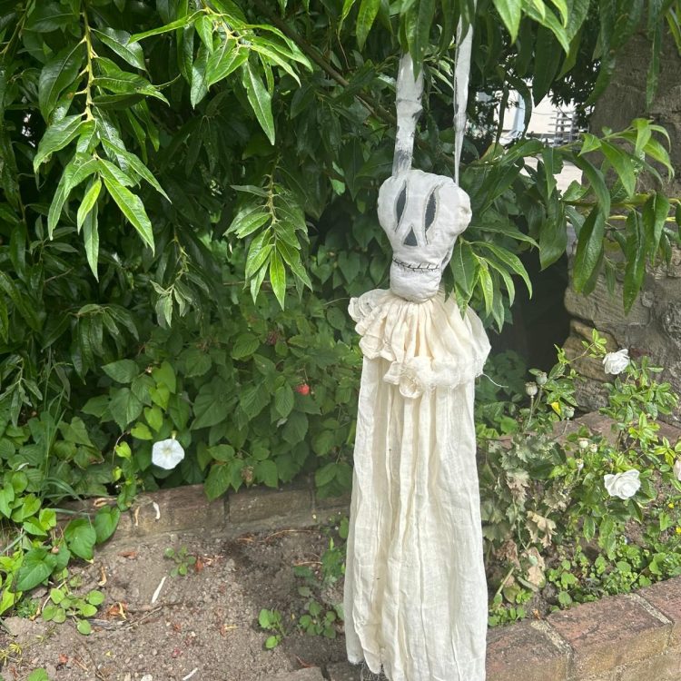 Spooky skeleton hanging decoration made by Family Fabric Creators staff and volunteers