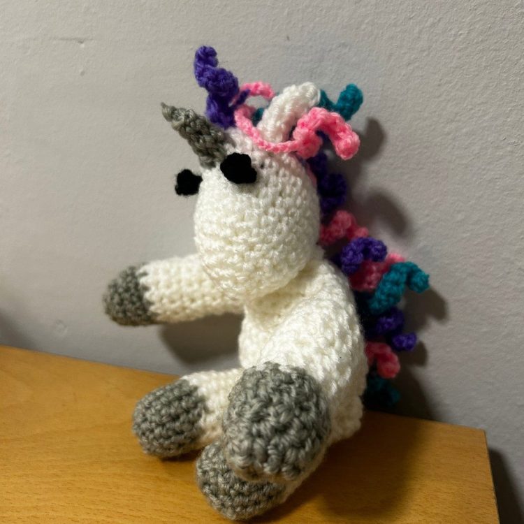 Crochet unicorn made by Sunderland Mind Fabric Creations member