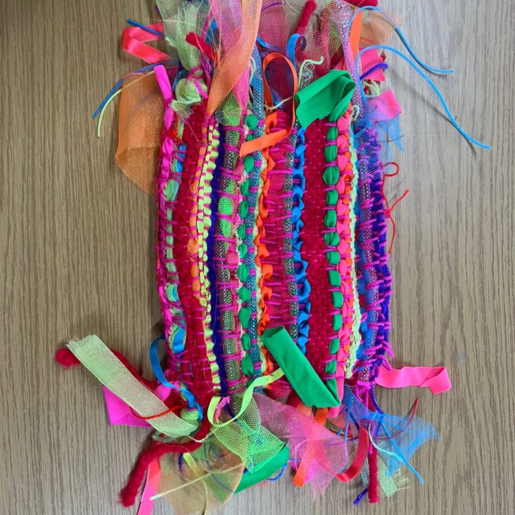 Rainbow sensory mat made by Sunderland Mind Fabric Creations member to donate to people with dementia.