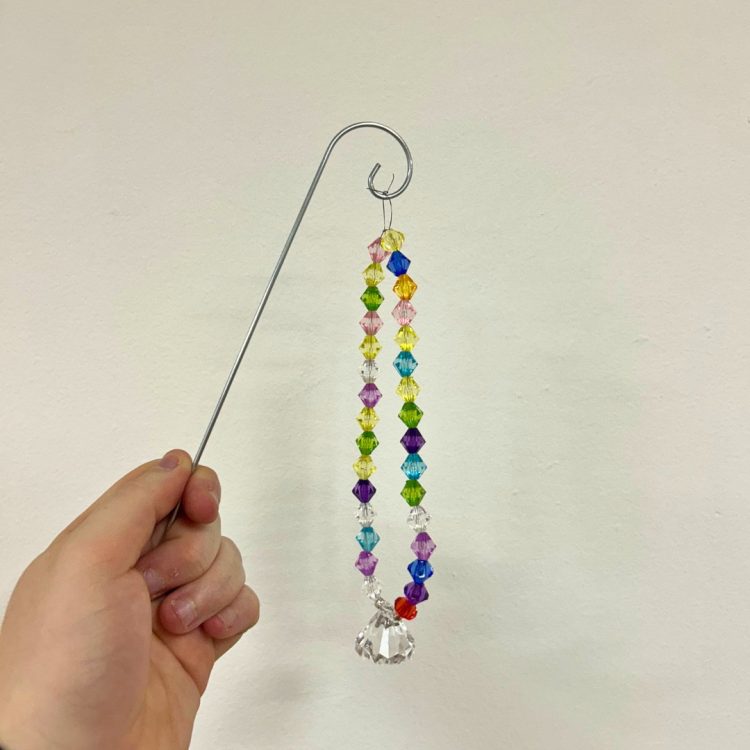 Multicoloured beaded garden ornament made by Craft Group Member